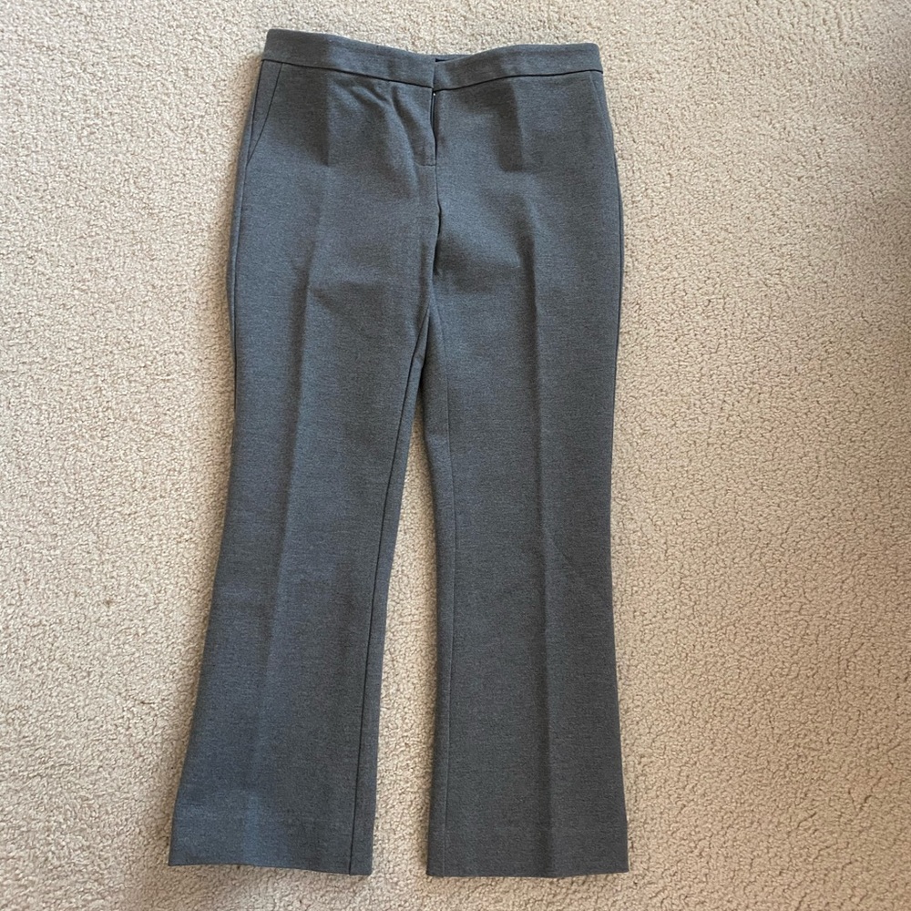 Dark gray dress pants.